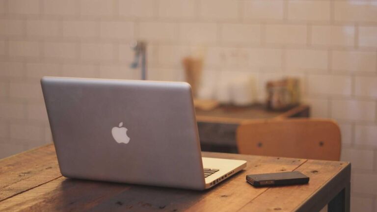Laptop on a wooden table