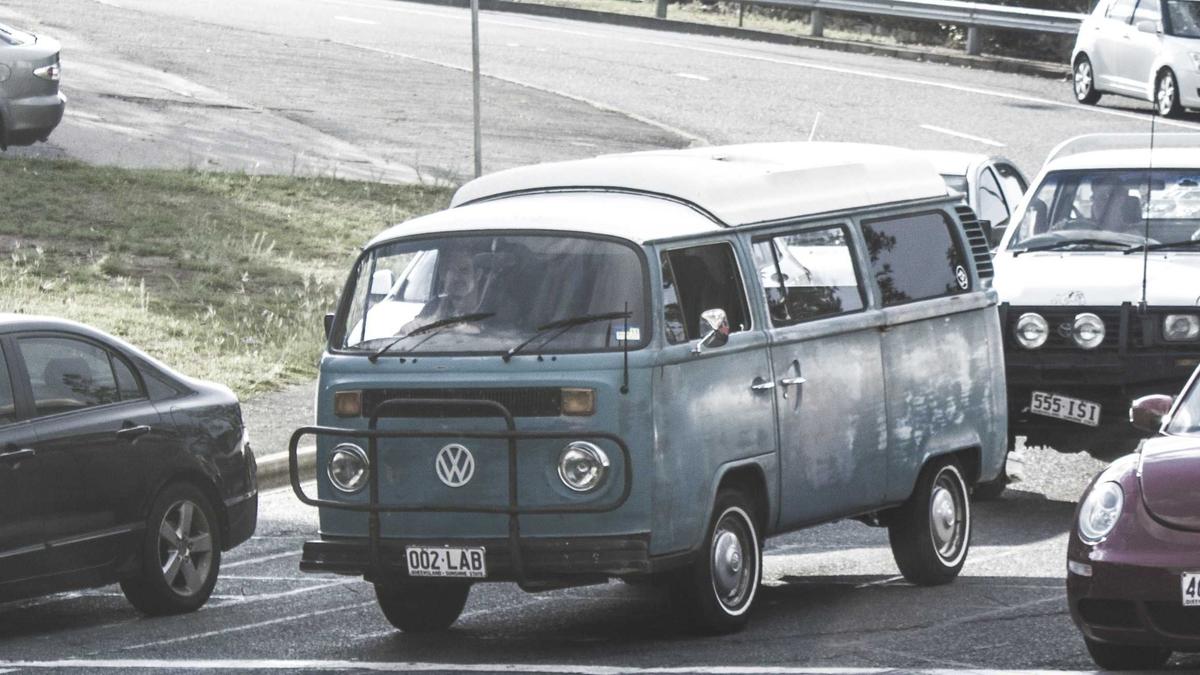 Vans parked on a street